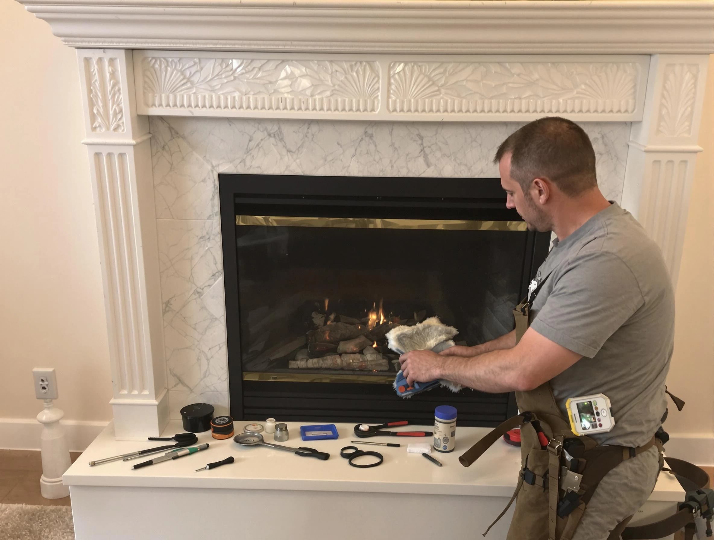 Spring Valley Chimney Sweep performing fireplace maintenance in Spring Valley, NY